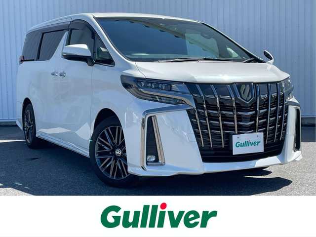 トヨタ アルファード S タイプゴールド 滋賀県 2020(令2)年 1.4万km ホワイトパールクリスタルシャイン 純正ディスプレイオーディオ/(フルセグ/Bluetooth)/DVDデッキ/トヨタセーフティーセンス/・プリクラッシュセーフティ/・レーダークルーズコントロール/・レーンキープアシスト/・ブラインドスポットモニター/・標識認識/・先行車発進告知/・オートハイビーム/LEDオートライト/フォグ/電動リアゲート/両側電動スライドドア/フリップダウンモニター/デジタルインナーミラー/バックカメラ/電動パーキング/ブレーキホールド/前後ドライブレコーダー/電動格納ミラー/クリアランスソナー/ドアバイザー/フロアMT付きAT/スペアキー/クラウン用ホイール