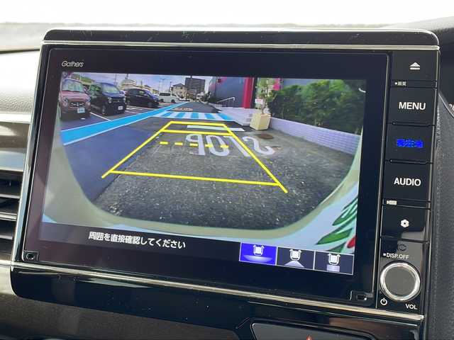 ホンダ Ｎ ＢＯＸ L コーディネートスタイル 広島県 2021(令3)年 2.3万km プレミアムアイボリーパールⅡ 純正8インチナビ/（Bluetooth/SD/CD/DVD/AppleCarPlay/AndroidAuto/フルセグTV)/前後ドライブレコーダー/バックカメラ/シートヒーター（運転席/助手席）/ビルドインETC/両側パワースライドドア/Honda SENSING/・衝突軽減ブレーキ（CMBS）/・誤発進抑制機能/・歩行者事故低減ステアリング/・路外逸脱抑制機能/・渋滞追従機能付アダプティブクルーズコントロール（ACC）/・車線維持支援システム（LKAS）/・先行車発進お知らせ機能/・標識認識機能/・後方誤発進抑制機能/LEDヘッドライト/オートマチックハイビーム/オートライト/純正フロアマット/スペアキー1本/スマートキー/取扱説明書