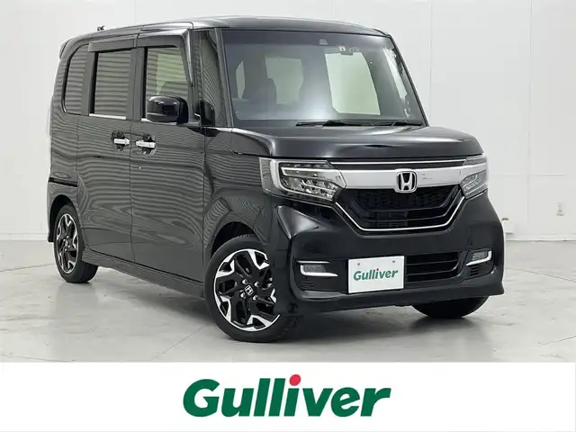 ホンダ Ｎ ＢＯＸ カスタム G L ターボ ホンダセンシング 茨城県 2018(平30)年 1.3万km クリスタルブラックパール ホンダセンシング/社外9インチナビ/カーテンエアバック/Bluetooth/ブルーレイ再生/フルセグテレビ/バックカメラ/両側パワースライドドア/追従型クルーズコントロール/LEDオートライト/オートマチックハイビーム/ハーフレザーシート/純正15インチホイール/スマートキー/USBポート/ビルトインETC