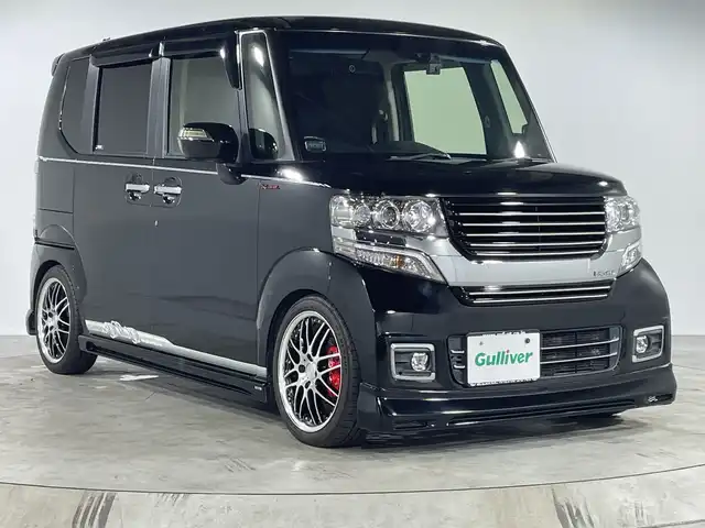 ホンダ Ｎ ＢＯＸ カスタムGターボSSブラッククタイル 福岡県 2017(平29)年 6.4万km クリスタルブラックパール 社外メモリーナビゲーション/フルセグテレビ/社外フリップダウンモニター/シートカバー/社外グリル/両側電動スライドドア/革巻きステアリング/ステアリングスイッチ/ドライブレコーダー/オートライト/社外アルミホイール