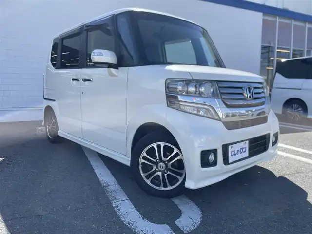 ホンダ Ｎ ＢＯＸ カスタム G SSパッケージ 熊本県 2013(平25)年 9.8万km プレミアムホワイトパール (株)IDOMが運営する【じしゃロン熊本店】の自社ローン専用車両になります。こちらは現金またはオートローンご利用時の価格です。自社ローンご希望の方は別途その旨お申付け下さい　/社外ナビ（NR-MZ33）/ワンセグテレビ/DVD/CD/Bluetooth接続/ETC/両側パワースライドドア/HIDヘッドライト/オートライト/クルーズコントロール/スマートキー/純正アルミホイール