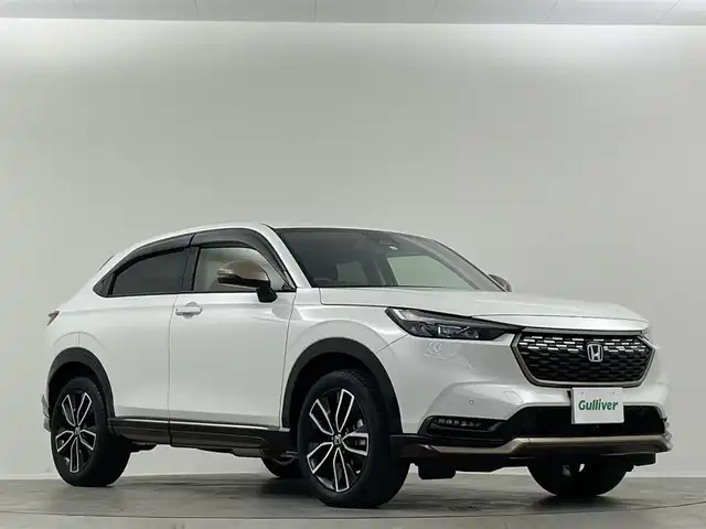 ホンダ ヴェゼル ハイブリッド e:HEV Z 埼玉県 2023(令5)年 1.9万km プラチナホワイトパール 純正ナビ　シートヒーター　バックカメラ　ＢＳＭ　ＥＴＣ　前後ドライブレコーダー　LEDヘッドライト　フルセグTV　MTモード付AT　寒冷地仕様　追加クルコン　ダウンヒルアシストコントロール　