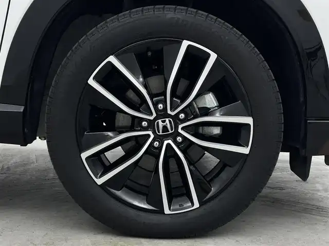 ホンダ ヴェゼル ハイブリッド e:HEV Z 埼玉県 2023(令5)年 1.9万km プラチナホワイトパール 純正ナビ　シートヒーター　バックカメラ　ＢＳＭ　ＥＴＣ　前後ドライブレコーダー　LEDヘッドライト　フルセグTV　MTモード付AT　寒冷地仕様　追加クルコン　ダウンヒルアシストコントロール　