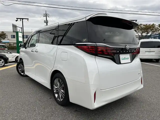 トヨタ アルファードハイブリット Z 鳥取県 2024(令6)年 0.1万km プラチナホワイトパールマイカ ワンオーナー/純正12.3インチDPオーディオ/BT/フルセグ/HDMI/パノラミックビューモニター/デジタルインナーミラー/トヨタチームメイト/ETC2.0/前席/二列目パワーシート/前席シートヒーター/ブラインドスポットモニター/左右独立ムーンルーフ/黒レザーシート/両側パワースライドドア/パワーバックドア/トヨタセーフティセンス/レーダークルーズコントロール/レーンキープアシスト/LEDヘットライト/フォグライト/純正18インチアルミホイール/ドアバイザー/スペアキー/スペアタイヤ/保証書/取扱説明書
