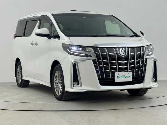 トヨタ アルファードハイブリット SR Cパッケージ 熊本県 2022(令4)年 4.8万km ホワイトパールクリスタルシャイン 禁煙車/トヨタセーフティセンス/純正9型ディスプレイオーディオナビTV/（T-CONNECT/CD/DVD/Bluetooth/フルセグTV）/純正リアフリップダウンモニター/純正ビルトイン2.0ETC/純正LEDオートライト/純正LEDフォグ/純正17インチアルミ/純正フロアマット/黒本革シート/Wサンルーフ/両側電動スライドドア/プリクラッシュセーフティ/アダプティブクルーズコントロール/レーンディパーチャーアラート/オートマチックハイビーム/クリアランスソナー/ブラインドスポットモニター/AC100V/エグゼクティブパワーシート/パワーバックドア/ステアリングヒーター/前席エアシート/シートヒーター/デジタルインナーミラー/スマートキー/プッシュエンジンスタート/新車時保証書/取扱い説明書