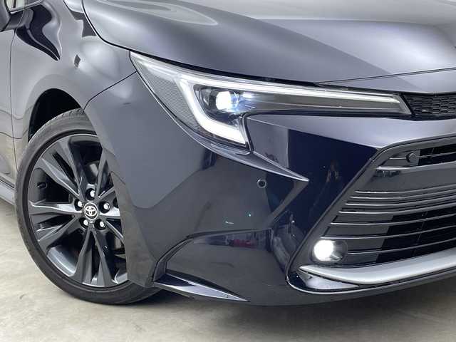 トヨタ カローラツーリング ダブルバイビー 島根県 2023(令5)年 3.7万km スパークリングブラックパールクリスタルシャイン プリクラッシュセーフティ/レーダークルーズコントロール/レーンディパーチャーアラート/ブラインドスポットモニター/ヘッドアップディスプレイ/プロアクティブドライビングアシスト/リアクロストラフィックアラート/パーキングサポートブレーキ/安心降車アシスト/ロードサインアシスト/純正ナビ/　・フルセグTV/　・Bluetooth/　・USB（タイプC）接続/ビルトインETC2.0/オートライト/オートハイビーム/LEDヘッドライト/ステアリングヒーター/ハーフレザーシート/シートヒーター/電熱線/革巻きステアリング/ステアリングスイッチ/置くだけ充電/オートブレーキホールド/オートドアミラー/ウィンカーミラー/純正フロアマット/純正ドアバイザー