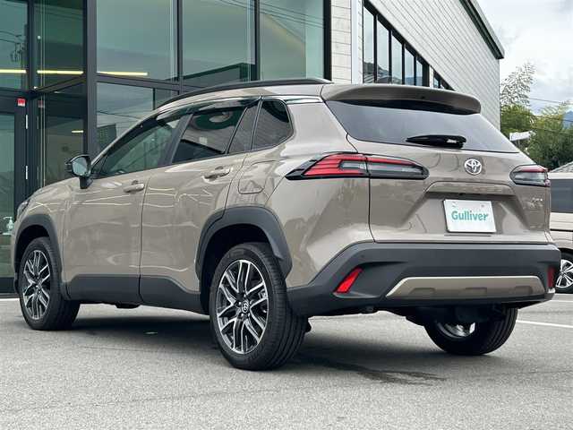 トヨタ カローラ クロス ハイブリッド Z 愛媛県 2025(令7)年 0.1千km 茶 純正10.5型ディスプレイオーディオ/全周囲カメラ/半革温冷電動シート/トヨタセーフティセンス/シグナルロードプロジェクション/レーダークルーズコントロール/ブラインドスポットモニター/アドバンストパーク/ワイヤレス充電/電動リアゲート/ステアリングヒーター/ステアリングリモコン/電格ミラー/ヒートミラー/ルーフレール/ETC2.0/電動パーキングブレーキ/TypeC入力端子/現状サマー(純正AW)(225/50R18)/MICHELIN PRIMACY4