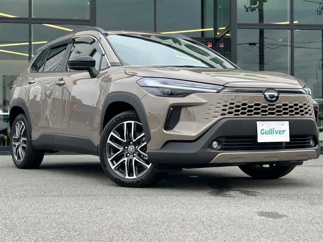 トヨタ カローラ クロス ハイブリッド Z 愛媛県 2025(令7)年 0.1千km 茶 純正10.5型ディスプレイオーディオ/全周囲カメラ/半革温冷電動シート/トヨタセーフティセンス/シグナルロードプロジェクション/レーダークルーズコントロール/ブラインドスポットモニター/アドバンストパーク/ワイヤレス充電/電動リアゲート/ステアリングヒーター/ステアリングリモコン/電格ミラー/ヒートミラー/ルーフレール/ETC2.0/電動パーキングブレーキ/TypeC入力端子/現状サマー(純正AW)(225/50R18)/MICHELIN PRIMACY4