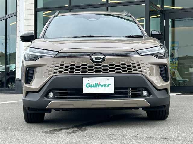 トヨタ カローラ クロス ハイブリッド Z 愛媛県 2025(令7)年 0.1千km 茶 純正10.5型ディスプレイオーディオ/全周囲カメラ/半革温冷電動シート/トヨタセーフティセンス/シグナルロードプロジェクション/レーダークルーズコントロール/ブラインドスポットモニター/アドバンストパーク/ワイヤレス充電/電動リアゲート/ステアリングヒーター/ステアリングリモコン/電格ミラー/ヒートミラー/ルーフレール/ETC2.0/電動パーキングブレーキ/TypeC入力端子/現状サマー(純正AW)(225/50R18)/MICHELIN PRIMACY4