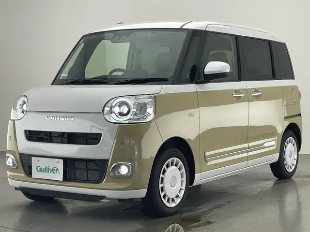 ダイハツ ムーヴ キャンバス ストライプス G 愛知県 2024(令6)年 0.8万km シャイニングホワイトパール/サンドベージュメタリック 社外ナビ　スマアシIII　シートヒーター　全方位カメラ　禁煙車　フルセグＴＶ　ＤＶＤ　Ｂｌｕｅｔｏｏｔｈ　ＵＳＢ　ドリンクホルダーヒーター　両側パワスラ　オートハイビーム　車線逸脱　衝突軽減　ＬＥＤライト　フォグランプ　社外マット カーテンエアバッグ