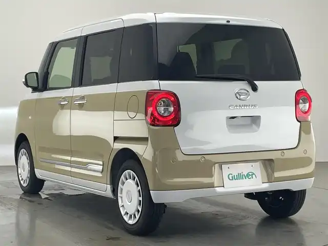 ダイハツ ムーヴ キャンバス ストライプス G 愛知県 2024(令6)年 0.8万km シャイニングホワイトパール/サンドベージュメタリック 社外ナビ　スマアシIII　シートヒーター　全方位カメラ　禁煙車　フルセグＴＶ　ＤＶＤ　Ｂｌｕｅｔｏｏｔｈ　ＵＳＢ　ドリンクホルダーヒーター　両側パワスラ　オートハイビーム　車線逸脱　衝突軽減　ＬＥＤライト　フォグランプ　社外マット カーテンエアバッグ