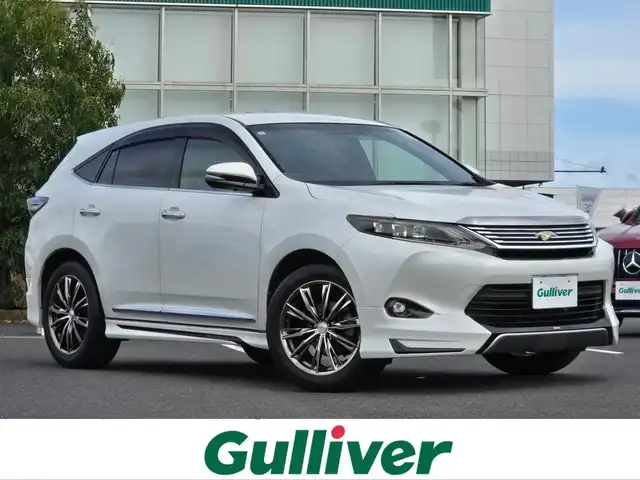 トヨタ ハリアー エレガンス 鹿児島県 2014(平26)年 7.8万km ホワイトパールクリスタルシャイン モデリスタフルエアロ　/社外アルミホイール（１９インチ）/ワンオーナー/ビルトインＥＴＣ　/社外ＳＤナビ　/Ｂｌｕｅｔｏｏｔｈ　/バックカメラ　/Ｄ席パワーシート　/ハーフレザー　/ＭＴモード付きＡＴ　/ＬＥＤヘッドライト/横滑り防止装置/プッシュスタート/スマートキー/エアバッグ(W+サイド)/カーテンエアバッグ