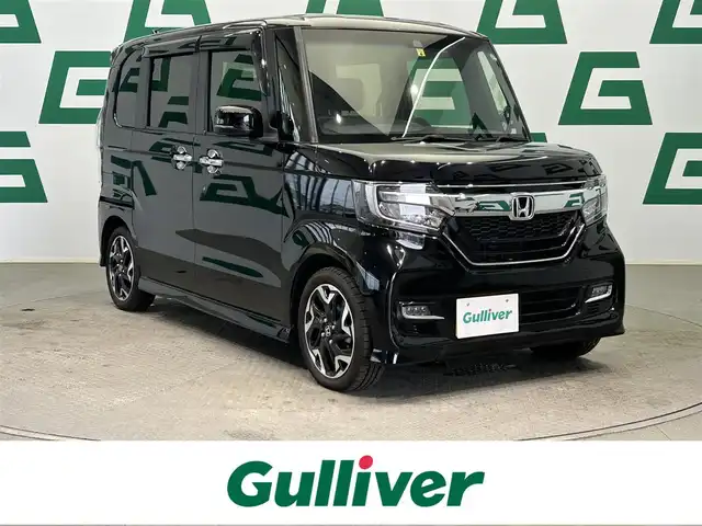 ホンダ Ｎ ＢＯＸ カスタム G L ターボ ホンダセンシング 鹿児島県 2020(令2)年 2.6万km クリスタルブラックパール 純正7インチナビ（VXM-204VFi）/・Bluetooth/・フルセグTV/・CD/DVD/バックカメラ/ビルトインETC/ホンダセンシング/オートライト/レーダークルーズコントロール/ステアリングリモコン/両側パワースライド/前席シートヒーター/後方コーナーセンサー/パドルシフト/LEDヘッドライト/フォグランプ/ハーフレザーシート/電格ミラー/プッシュスタート