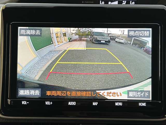 トヨタ エスクァイア Gi 福岡県 2020(令2)年 2.5万km ブラッキッシュアゲハガラスフレーク フリップダウンモニター/純正9インチナビ/（BT/フルセグ/AM/FM/DISC/SD/SDREC)/バックカメラ/両側パワースライドドア/クルーズコントロール/DUALオートACC/LEDヘッドライト/フォグランプ/オートマチックハイビーム/オートライト/レザーシート/DN席シートヒーター/純正15インチAW/アイドリングストップ/横滑り防止装置/盗難防止装置/レーンキープアシスト/コーナーセンサー/USB入力端子/オート電動格納ミラー/後席用テーブル/サンシェード/スマートキー/ETC/保証書/取扱説明書