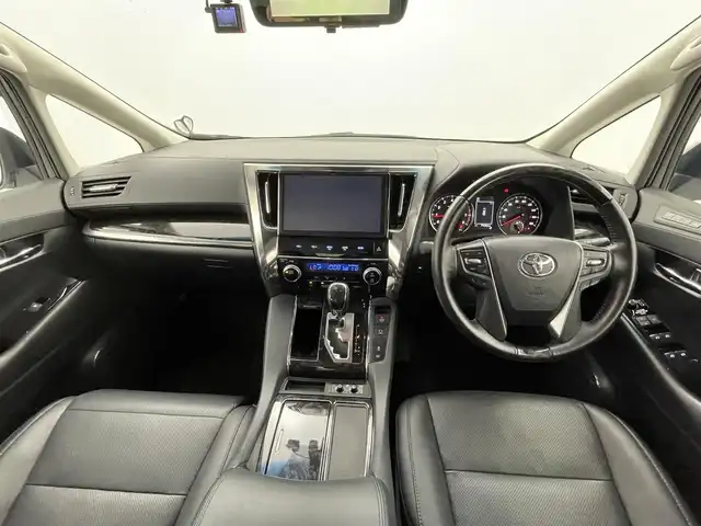トヨタ アルファード S Cパッケージ 熊本県 2018(平30)年 8万km ホワイトパールクリスタルシャイン モデリスタエアロフル　/サンルーフ　/純正ナビ（ＣＤ・ＤＶＤ・フルセグ・ＢＴ・ＳＤ・ＨＤＭＩ）/バックカメラ　/純正フリップダウンモニター/社外前方ドライブレコーダー　/ビルトインＥＴＣ　/両側パワースライドドア/前席シートヒーター/前席エアーシート/前席パワーシート/ステアリングヒーター/オットマン/衝突軽減ブレーキ/横滑り防止/前後クリアランスソナー/デジタルインナーミラー/純正フロアマット/純正１８インチAW/オートライト/三眼LEDヘッドライト/オートマチックハイビーム/フォグライト/スマートキー/プッシュスタート/取扱説明書