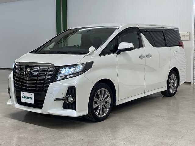 トヨタ アルファード S Aパッケージ タイプブラック 熊本県 2017(平29)年 8.4万km ホワイトパールクリスタルシャイン パイン11型メモリナビ（ＤＶＤ/ＣＤ/ＢＴ/フルセグ/ラジオ）/アルパインフリップダウンモニター/バックカメラ/ＥＴＣ/前方ドライブレコーダー/クルーズコントロール/両側パワースライドドア/ステアリングスイッチ/オートライト/フォグランプ/衝突軽減システム/横滑り防止装置/前後コーナーセンサー/電動パーキングブレーキ/プッシュスタート/スマートキー×２/社外フロアマット/純正18インチＡＷ/ドアバイザー/ワンオーナー