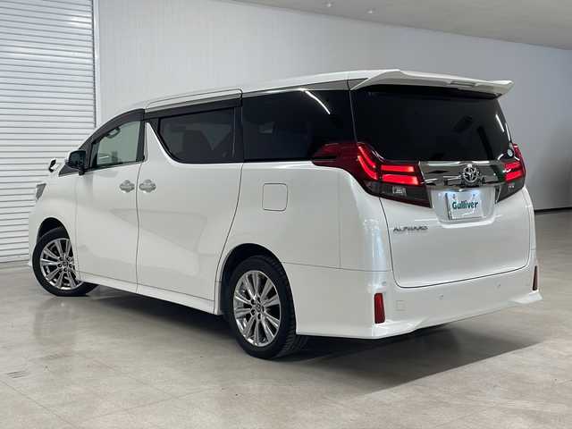 トヨタ アルファード S Aパッケージ タイプブラック 熊本県 2017(平29)年 8.4万km ホワイトパールクリスタルシャイン パイン11型メモリナビ（ＤＶＤ/ＣＤ/ＢＴ/フルセグ/ラジオ）/アルパインフリップダウンモニター/バックカメラ/ＥＴＣ/前方ドライブレコーダー/クルーズコントロール/両側パワースライドドア/ステアリングスイッチ/オートライト/フォグランプ/衝突軽減システム/横滑り防止装置/前後コーナーセンサー/電動パーキングブレーキ/プッシュスタート/スマートキー×２/社外フロアマット/純正18インチＡＷ/ドアバイザー/ワンオーナー