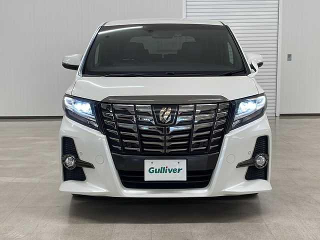 トヨタ アルファード S Aパッケージ タイプブラック 熊本県 2017(平29)年 8.4万km ホワイトパールクリスタルシャイン パイン11型メモリナビ（ＤＶＤ/ＣＤ/ＢＴ/フルセグ/ラジオ）/アルパインフリップダウンモニター/バックカメラ/ＥＴＣ/前方ドライブレコーダー/クルーズコントロール/両側パワースライドドア/ステアリングスイッチ/オートライト/フォグランプ/衝突軽減システム/横滑り防止装置/前後コーナーセンサー/電動パーキングブレーキ/プッシュスタート/スマートキー×２/社外フロアマット/純正18インチＡＷ/ドアバイザー/ワンオーナー