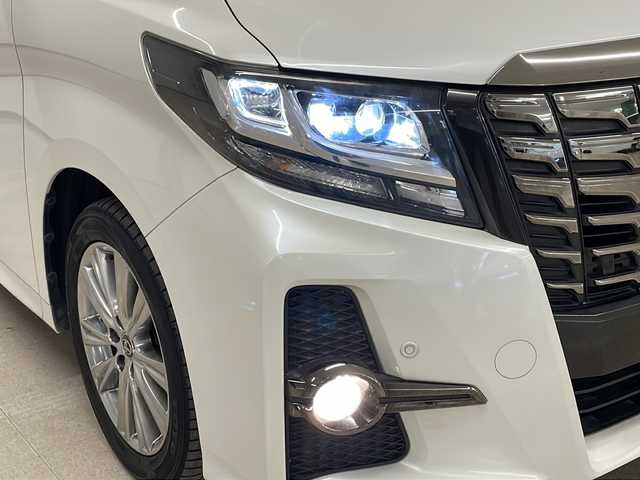 トヨタ アルファード S Aパッケージ タイプブラック 熊本県 2017(平29)年 8.4万km ホワイトパールクリスタルシャイン パイン11型メモリナビ（ＤＶＤ/ＣＤ/ＢＴ/フルセグ/ラジオ）/アルパインフリップダウンモニター/バックカメラ/ＥＴＣ/前方ドライブレコーダー/クルーズコントロール/両側パワースライドドア/ステアリングスイッチ/オートライト/フォグランプ/衝突軽減システム/横滑り防止装置/前後コーナーセンサー/電動パーキングブレーキ/プッシュスタート/スマートキー×２/社外フロアマット/純正18インチＡＷ/ドアバイザー/ワンオーナー