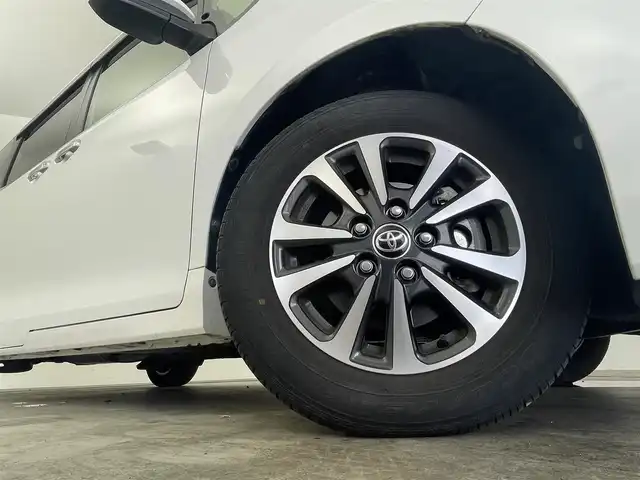 トヨタ エスクァイア ハイブリッド Gi プレミアムパッケージ ブラックテーラード 群馬県 2021(令3)年 1.6万km ホワイトパールクリスタルシャイン 純正ナビ　バックカメラ　フリップダウンモニター　両側パワースライドドア　衝突軽減　レーンアシスト　オートマチックハイビーム　ステアリングヒーター　シートヒーター　ビルトインETC　禁煙車