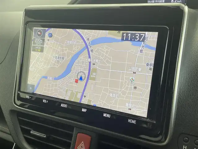 トヨタ エスクァイア ハイブリッド Gi プレミアムパッケージ ブラックテーラード 群馬県 2021(令3)年 1.6万km ホワイトパールクリスタルシャイン 純正ナビ　バックカメラ　フリップダウンモニター　両側パワースライドドア　衝突軽減　レーンアシスト　オートマチックハイビーム　ステアリングヒーター　シートヒーター　ビルトインETC　禁煙車