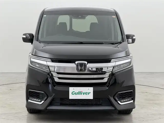 ホンダ ステップワゴン スパーダ ハイブリッド G EX ホンダセンシング 福岡県 2019(平31)年 4.4万km プレミアムスパークルブラックパール フリップダウンモニター　/純正９インチナビ　/バックカメラ　/ホンダセンシング　/わくわくゲート　/ＥＴＣ　/両側パワースライドドア　/前席シートヒーター　/ハーフレザーシート　/純正１６インチＡＷ　/ＬＥＤヘッドライト