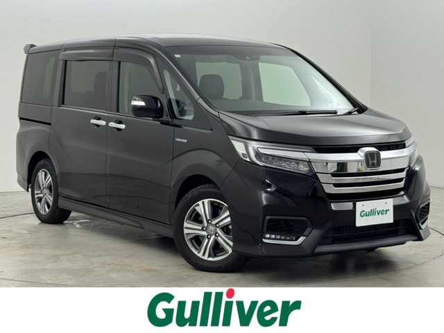 ホンダ ステップワゴン スパーダ ハイブリッド G EX ホンダセンシング 福岡県 2019(平31)年 4.4万km プレミアムスパークルブラックパール フリップダウンモニター　/純正９インチナビ　/バックカメラ　/ホンダセンシング　/わくわくゲート　/ＥＴＣ　/両側パワースライドドア　/前席シートヒーター　/ハーフレザーシート　/純正１６インチＡＷ　/ＬＥＤヘッドライト