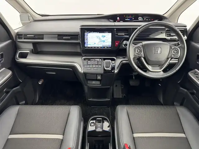 ホンダ ステップワゴン スパーダ ハイブリッド G EX ホンダセンシング 福岡県 2019(平31)年 4.4万km プレミアムスパークルブラックパール フリップダウンモニター　/純正９インチナビ　/バックカメラ　/ホンダセンシング　/わくわくゲート　/ＥＴＣ　/両側パワースライドドア　/前席シートヒーター　/ハーフレザーシート　/純正１６インチＡＷ　/ＬＥＤヘッドライト