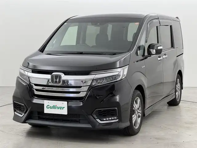 ホンダ ステップワゴン スパーダ ハイブリッド G EX ホンダセンシング 福岡県 2019(平31)年 4.4万km プレミアムスパークルブラックパール フリップダウンモニター　/純正９インチナビ　/バックカメラ　/ホンダセンシング　/わくわくゲート　/ＥＴＣ　/両側パワースライドドア　/前席シートヒーター　/ハーフレザーシート　/純正１６インチＡＷ　/ＬＥＤヘッドライト