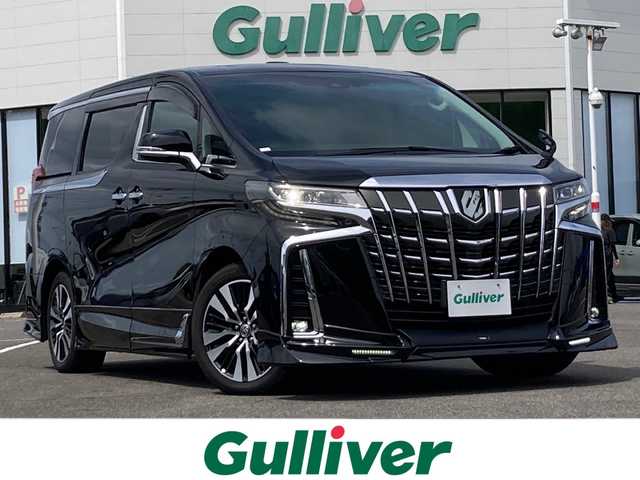 トヨタ アルファード S Cパッケージ 佐賀県 2021(令3)年 1.7万km ブラック TRDスポイラー/ツインムーンルーフ/純正ディスプレイオーディオ/ナビキット/純正フリップダウンモニター/両側パワースライドドア/プリクラッシュセーフティ/レーンディパーチャーアラート/オートハイビーム/アダプティブクルーズコントロール/クリアランスソナー/ブラインドスポットモニター/リアクロストラフィックアラート/スマートルームミラー/電動パーキングブレーキ/オートブレーキホールド/レザーシート/シートヒーター/エアシート/メモリパワーシートシート/オットマン/パワーバックドア/ビルトインETC2.0/ステアリングヒーター/ステアリングリモコン/プッシュスタート/スマートキー/三眼LEDヘッドライト/フォグライト/モデリスタミラーガーニッシュ/モデリスタバックドアガーニッシュ/純正アルミホイール