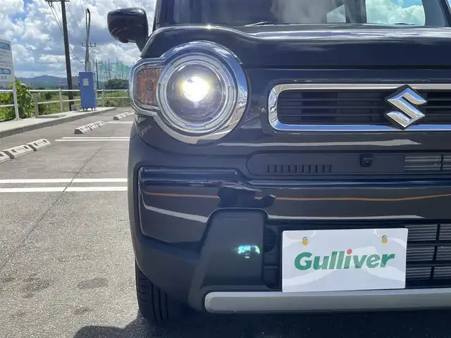スズキ ハスラー HYBRID G 佐賀県 2024(令6)年 0.5万km ブルーイッシュブラックパール3 タフスタイルデカールセット/純正9インチメモリーナビゲーション/・フルセグTV/CD/DVD/USB/Bluetooth/全方位モニター/ビルトインETC/DN席シートヒーター/ISOFIX対応/ステアリングリモコン/純正LEDヘッドライト/オートマチックハイビーム/新車保証書/取扱説明書/スズキセーフティサポート/・アダプディブクルーズコントロール/・デュアルカメラブレーキサポート/・車線逸脱警報機能/・パーキングセンサー