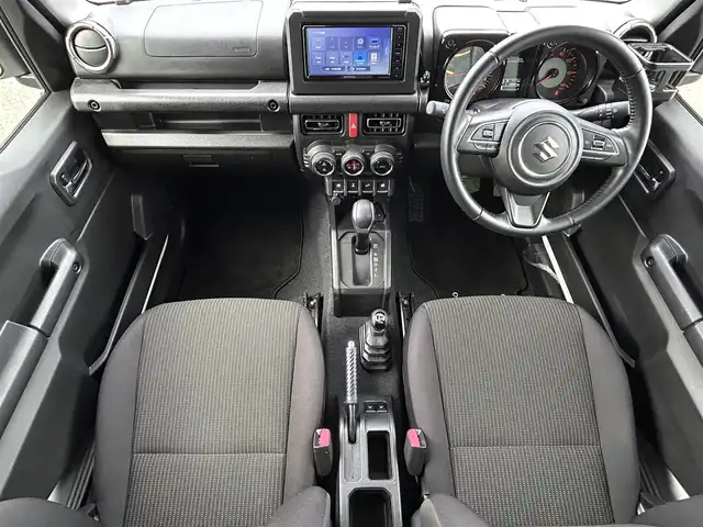 スズキ ジムニー XC 愛媛県 2020(令2)年 2.5万km ピュアホワイトP KENWOOD7型ナビ/バックカメラ/ドライブレコーダー/クルーズコントロール/社外マット/前席シートヒーター/衝突被害軽減装置/車線逸脱防止装置/ヒートミラー/電格ミラー/シガーソケット/ヘッドライトウォッシャー/ステアリングリモコン/トランスファーレバー/現状サマー(純正AW）(175/80/R16)/BRIDGESTONE DUELER H/T 684II