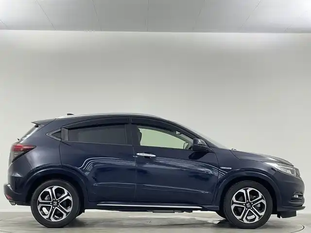 ホンダ ヴェゼル ハイブリッド Z ホンダセンシング 埼玉県 2018(平30)年 4.5万km ミッドナイトブルービームM ホンダセンシング　純正７インチナビ　フルセグＴＶ　Ｂｌｕｅｔｏｏｔｈ　バックカメラ　ブラックハーフレザーシート　前席シートヒーター　革巻きステアリング　パドルシフト　ビルトインＥＴＣ　ドラレコ
