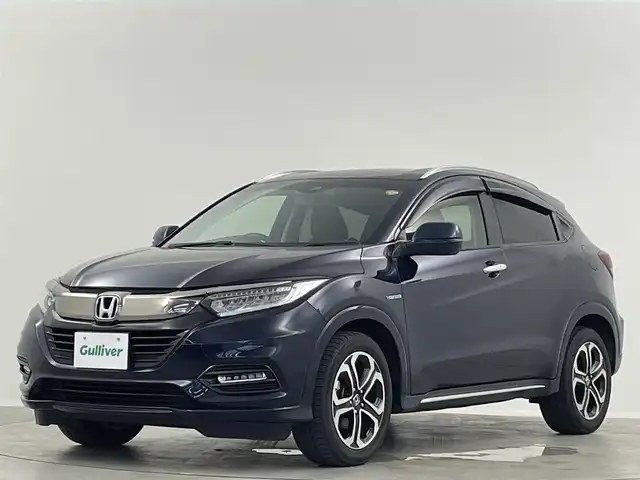 ホンダ ヴェゼル ハイブリッド Z ホンダセンシング 埼玉県 2018(平30)年 4.5万km ミッドナイトブルービームM ホンダセンシング　純正７インチナビ　フルセグＴＶ　Ｂｌｕｅｔｏｏｔｈ　バックカメラ　ブラックハーフレザーシート　前席シートヒーター　革巻きステアリング　パドルシフト　ビルトインＥＴＣ　ドラレコ