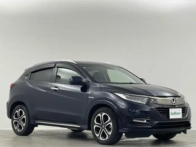 ホンダ ヴェゼル ハイブリッド Z ホンダセンシング 埼玉県 2018(平30)年 4.5万km ミッドナイトブルービームM ホンダセンシング　純正７インチナビ　フルセグＴＶ　Ｂｌｕｅｔｏｏｔｈ　バックカメラ　ブラックハーフレザーシート　前席シートヒーター　革巻きステアリング　パドルシフト　ビルトインＥＴＣ　ドラレコ