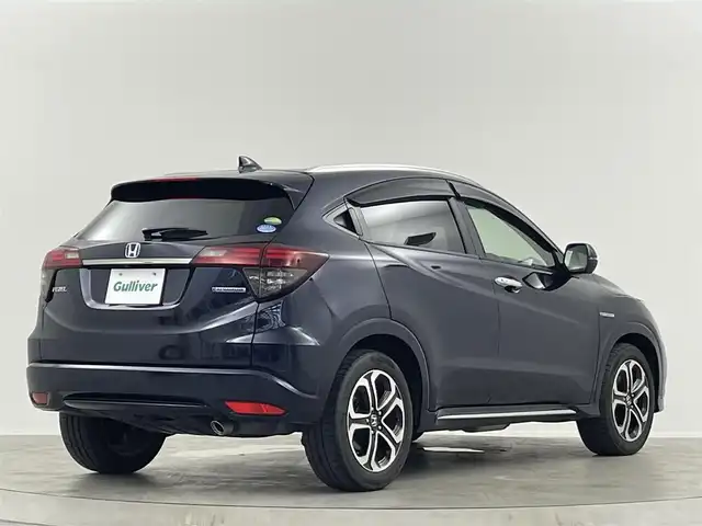 ホンダ ヴェゼル ハイブリッド Z ホンダセンシング 埼玉県 2018(平30)年 4.5万km ミッドナイトブルービームM ホンダセンシング　純正７インチナビ　フルセグＴＶ　Ｂｌｕｅｔｏｏｔｈ　バックカメラ　ブラックハーフレザーシート　前席シートヒーター　革巻きステアリング　パドルシフト　ビルトインＥＴＣ　ドラレコ