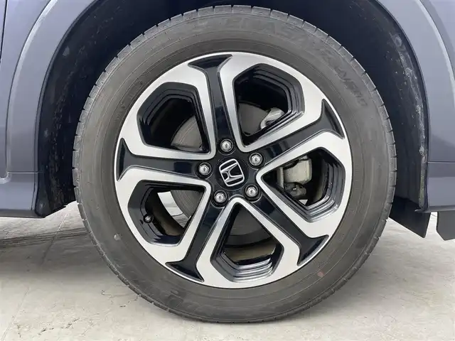 ホンダ ヴェゼル ハイブリッド Z ホンダセンシング 埼玉県 2018(平30)年 4.5万km ミッドナイトブルービームM ホンダセンシング　純正７インチナビ　フルセグＴＶ　Ｂｌｕｅｔｏｏｔｈ　バックカメラ　ブラックハーフレザーシート　前席シートヒーター　革巻きステアリング　パドルシフト　ビルトインＥＴＣ　ドラレコ