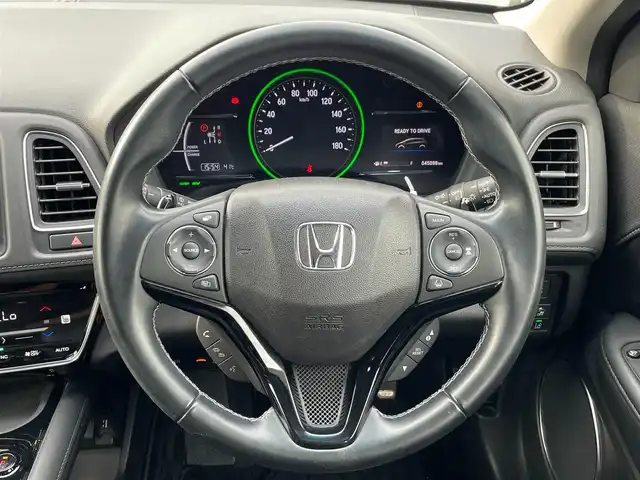 ホンダ ヴェゼル ハイブリッド Z ホンダセンシング 埼玉県 2018(平30)年 4.5万km ミッドナイトブルービームM ホンダセンシング　純正７インチナビ　フルセグＴＶ　Ｂｌｕｅｔｏｏｔｈ　バックカメラ　ブラックハーフレザーシート　前席シートヒーター　革巻きステアリング　パドルシフト　ビルトインＥＴＣ　ドラレコ