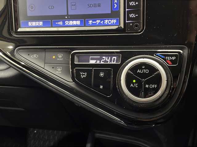 トヨタ アクア クロスオーバー 栃木県 2019(令1)年 1.8万km イエロー 純正ナビ/（CD/Bluetooth/SD/AUX）/バックカメラ/ビルトインETC/シートヒーター/オートライト/LEDヘッドライト/横滑り防止装置/スマートキー/プッシュスタート/ステアリングスイッチ/革巻きステアリング/電動格納ミラー/純正アルミホイール/社外フロアマット