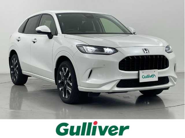 ホンダ ＺＲ－Ｖ ハイブリッド e:HEV Z 熊本県 2024(令6)年 1.9万km プラチナホワイトパール 純正ナビ　/全周囲カメラ　/前後ドライブレコーダー　/ビルトインＥＴＣ２．０　/前後クリアランスソナー　/前席シートヒーター　/前席パワーシート　/パワーバックドア　/ステアリングヒーター　/ホンダセンシング/・路外逸脱制御機能/・ブラインドスポットモニター/・踏み間違い軽減システム/・衝突軽減ブレーキ/・レーダークルーズコントロール/・レーンキープアシスト/横滑り防止/ダウンヒルアシスト/社外ゴムフロアマット/純正１８インチAW/オートライト/LEDヘッドライト/フォグライト/スマートキー/プッシュスタート/保証書