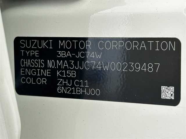 スズキ ジムニー ノマド FC 熊本県 2025(令7)年 0.1万km アークティックホワイトパール 禁煙車　/後ろのみクリアランスソナー　/スズキセーフティサポート/・デュアルセンサーブレーキサポート/・先行車発進お知らせ機能/・標識認識機能/・車線逸脱抑制機能/・ふらつき警報機能/・アダブティブクルーズコントロール/・誤発進制御機能/・後方誤発進抑制機能/横滑り防止/アイドリングストップ/ダウンヒルアシスト/前席シートヒーター/純正１５インチAW/オートライト/LEDヘッドライト/フォグライト/背面タイヤ/スマートキー/プッシュスタート/スペアキー1本