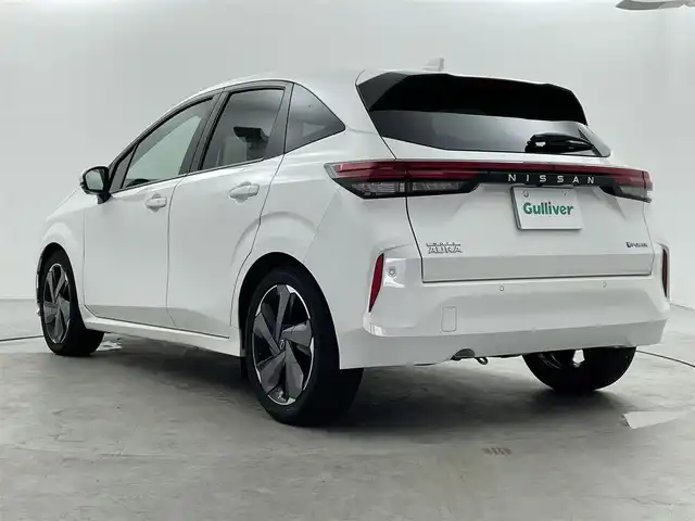 日産 オーラ G レザーエディション 福井県 2021(令3)年 2.7万km ピュアホワイトパール 純正ナビゲーション/【AM/FM/Bluetooth/フルセグTV/HDMI】/アラウンドビューモニター/ビルトインETC2.0/プロパイロット/・衝突軽減ブレーキ/・クルーズコントロール（追従有）/・車線逸脱警報機能/・レーンキープアシスト/インテリジェントルームミラー/BOSEスピーカー/プッシュスタート/スマートキー/スペアキー/オートライト/LEDヘッドライド/取扱説明書/新車時保証書