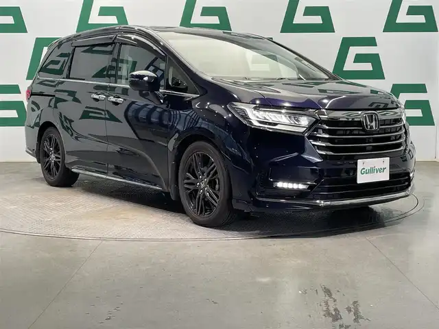 ホンダ オデッセイ アブソルート EX 鹿児島県 2021(令3)年 1.8万km 黒 禁煙車　/純正ナビ　/・フルセグＴＶ　/・Ｂｌｕｅｔｏｏｔｈ　/・DVD/CD　/・ＨＤＭＩ　/純正前後ドラレコ　/両側パワスラ　/ホンダセンシング　　　/前席シートヒーター　/全方位カメラ　/前後コーナーセンサー　/前席パワーシート/オットマン/ブラインドスポットインフォメーション/ドアバイザー/パワーバックドア/ステリモ/純正ビルドインETC2.0