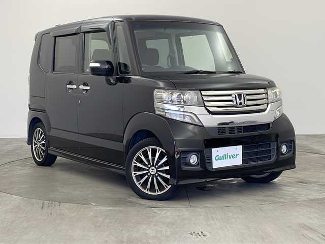 ホンダ Ｎ ＢＯＸ カスタム G ターボパッケージ 兵庫県 2013(平25)年 7.1万km クリスタルブラックパール ・Lパッケージ/・ターボパッケージ/・クルーズコントロール/・パドルシフト/・純正15インチアルミホイール/・社外7ナビ（AVIC-RZ900）CD/DVD/SD/フルセグ/BT/・バックカメラ/・ETC/・両側パワースライドドア/・本革巻きステアリング/・HIDヘッドライト/・オートライト/・フォグランプ/・スマートキー/・プッシュスタート/・純正フロアマット/・ドアバイザー/・横滑り防止装置/・アイドリングストップ