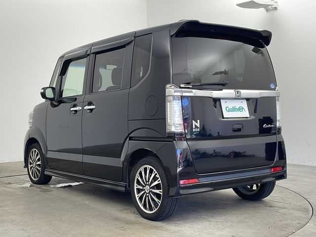 ホンダ Ｎ ＢＯＸ カスタム G ターボパッケージ 兵庫県 2013(平25)年 7.1万km クリスタルブラックパール ・Lパッケージ/・ターボパッケージ/・クルーズコントロール/・パドルシフト/・純正15インチアルミホイール/・社外7ナビ（AVIC-RZ900）CD/DVD/SD/フルセグ/BT/・バックカメラ/・ETC/・両側パワースライドドア/・本革巻きステアリング/・HIDヘッドライト/・オートライト/・フォグランプ/・スマートキー/・プッシュスタート/・純正フロアマット/・ドアバイザー/・横滑り防止装置/・アイドリングストップ