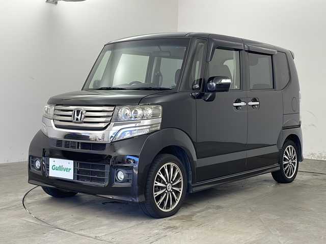 ホンダ Ｎ ＢＯＸ カスタム G ターボパッケージ 兵庫県 2013(平25)年 7.1万km クリスタルブラックパール ・Lパッケージ/・ターボパッケージ/・クルーズコントロール/・パドルシフト/・純正15インチアルミホイール/・社外7ナビ（AVIC-RZ900）CD/DVD/SD/フルセグ/BT/・バックカメラ/・ETC/・両側パワースライドドア/・本革巻きステアリング/・HIDヘッドライト/・オートライト/・フォグランプ/・スマートキー/・プッシュスタート/・純正フロアマット/・ドアバイザー/・横滑り防止装置/・アイドリングストップ