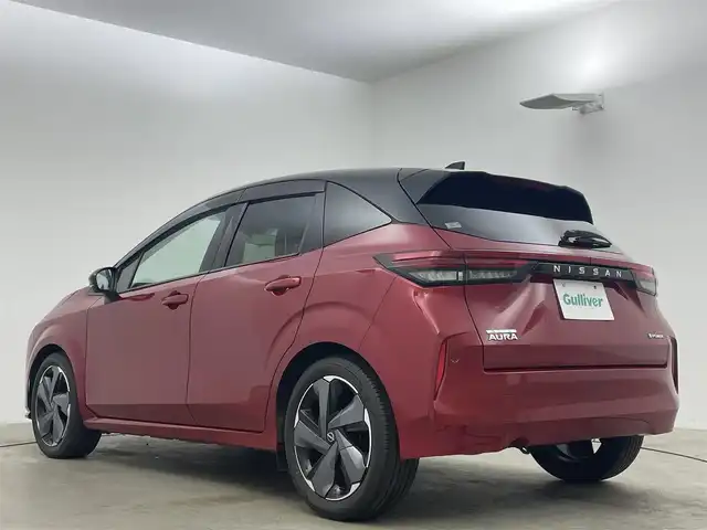 日産 オーラ G レザーエディション 岡山県 2022(令4)年 2万km ガーネットレッド/スーパーブラック 2トーン 純正９インチナビ　ＢＯＳＥサウンド　プロパイロット　衝突軽減ブレーキ　アラウンドビューモニター　ビルトインＥＴＣ２．０　三眼ＬＥＤヘッドライト　デジタルインナーミラー　ドライブレコーダー　ＵＳＢ接続