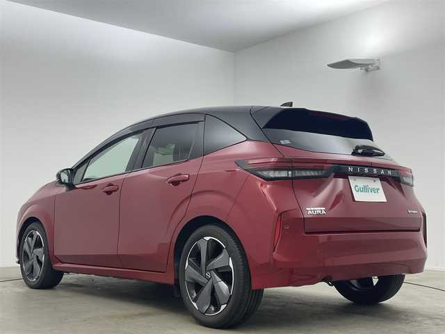 日産 オーラ G レザーエディション 岡山県 2022(令4)年 2万km ガーネットレッド/スーパーブラック 2トーン 純正９インチナビ　ＢＯＳＥサウンド　プロパイロット　衝突軽減ブレーキ　アラウンドビューモニター　ビルトインＥＴＣ２．０　三眼ＬＥＤヘッドライト　デジタルインナーミラー　ドライブレコーダー　ＵＳＢ接続