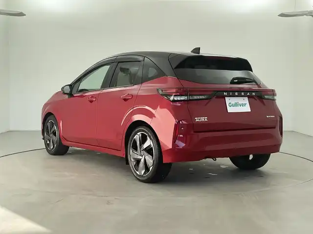 日産 オーラ G レザーエディション 福井県 2022(令4)年 2万km ガーネットレッド/スーパーブラック 2トーン 純正９インチナビ/　（CD/DVD/フルセグTV/Bluetooth/USB）/アラウンドビューモニター/ＢＯＳＥサウンド　/プロパイロット　/エマージェンシーブレーキ/ビルトインＥＴＣ２．０　/三眼ＬＥＤヘッドライト　/デジタルインナーミラー　/ドライブレコーダー　/純正17インチAW