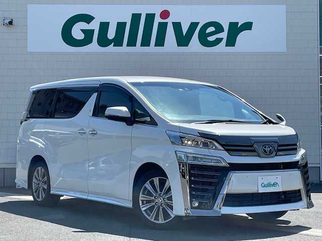 トヨタ ヴェルファイア ゴールデンアイズⅢ 静岡県 2022(令4)年 5.2万km ホワイトパールクリスタルシャイン ●純正ナビ/(Bluetooth)/●ハーフレザーシート/●バックカメラ/●レーダークルーズコントロール/●ブラインドスポットモニター/●衝突被害軽減システム/●レーンキープアシスト/●前後コーナーセンサー/●電動パーキングブレーキ/●オートブレーキホールド/●三眼LEDライト＆フォグランプ/●オートライト/●オートマチックハイビーム/●コンビステアリング/●ステアリングスイッチ/●ETC/●前後ドライブレコーダー/●電動リアゲート/●デジタルインナーミラー/●オットマン/●両側パワースライド/●ドアバイザー/●スマートキー/●プッシュスタート/●純正フロアマット/●純正18インチアルミホイール/●W＋サイド＋ニーSRS＋ABS